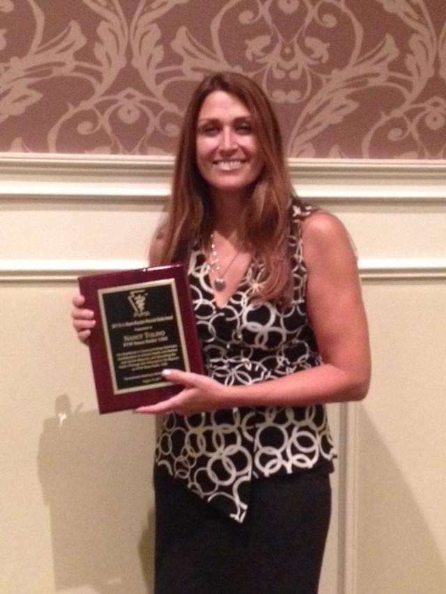 Nancy receiving her NJVMA award